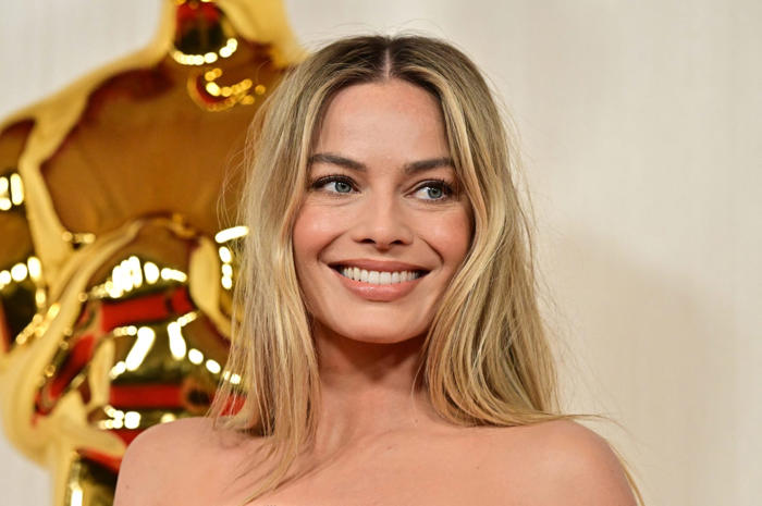 ‘barbie’ star margot robbie says selling her own alcohol brand was easier than selling her $1.4 billion movie idea