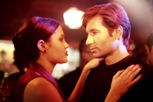 david duchovny feels like he had a hand in 'discovering' angelina jolie: 'i just knew she was a movie star'