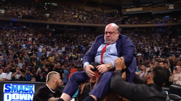 the bloodline just put paul heyman through a table