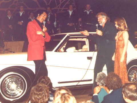 Kenny Roger Next to his 1987 Stutz IV Porte