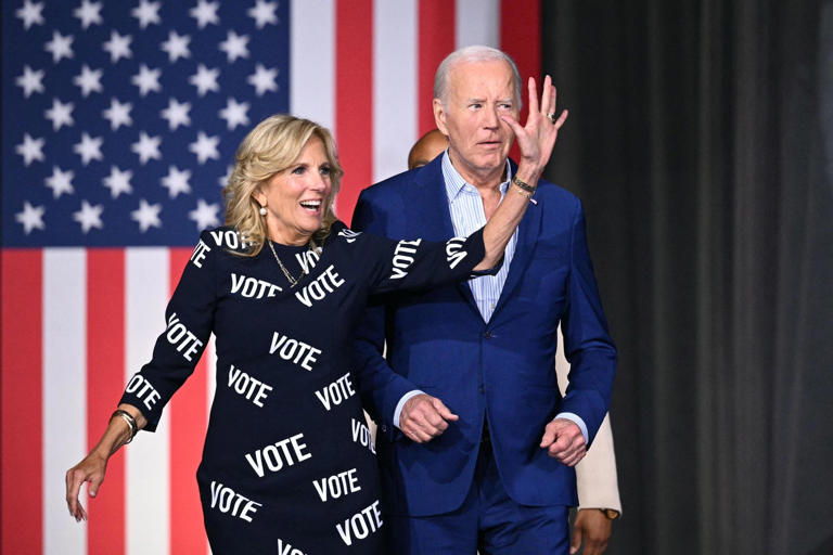 US President Joe Biden and First Lady Jill Biden arrive to speak at a campaign event in Raleigh, North Carolina, on June 28, 2024. (Photo by Mandel NGAN / AFP)
