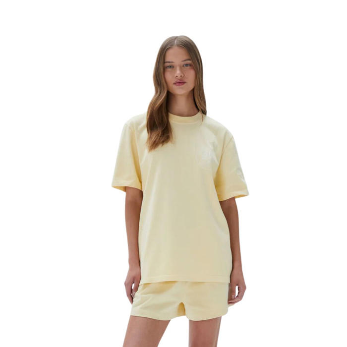 butter yellow athleisure is all i want to wear in this heat: 9 picks that prove it’s the it shade of the summer