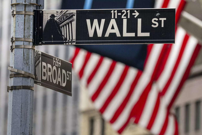 wall street ends lower as investors digest inflation data, presidential debate