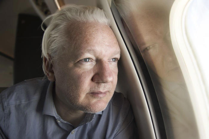 the saipan surprise: how delicate talks led to the unlikely end of julian assange's 12-year saga