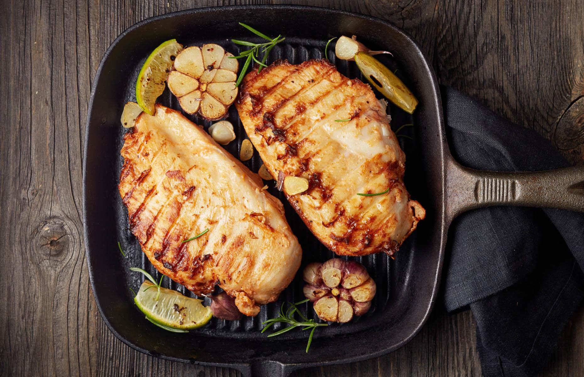 Cook breasts with a heavy grill pan