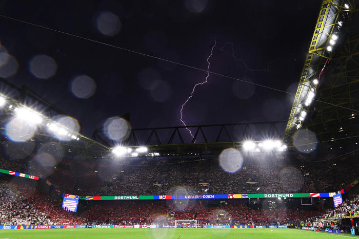 huge thunderstorm sees euro 2024 clash between germany and denmark temporarily suspended