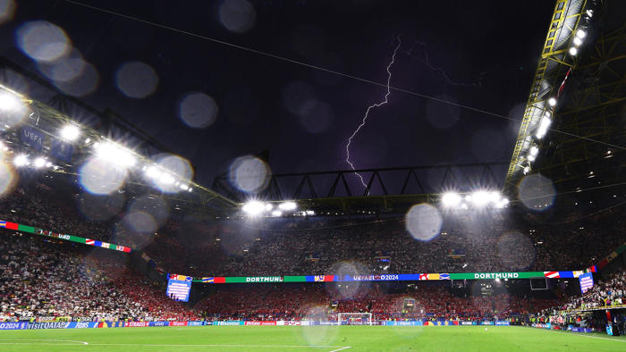 germany v denmark game temporarily suspended over adverse weather