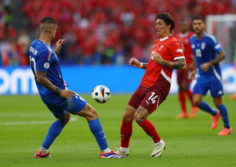 soccer-reigning champions italy sent packing by super swiss strikes