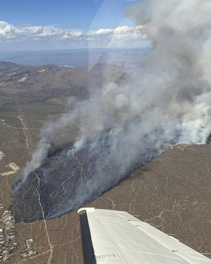 arizona wildfire advances after forcing evacuations near phoenix