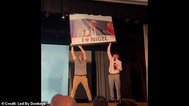pranksters interrupt farage speech with banner mocking ukraine views