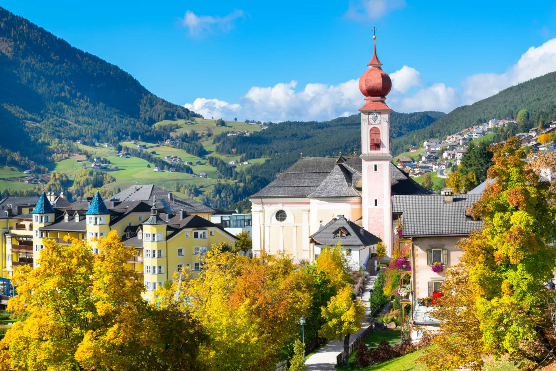 <p>Located within the Dolomites mountain range, the market town of Ortisei in Italy's South Tyrol province is centered around the beautiful little baroque church of Sant’Ulrico, recognized for its onion-shaped dome.</p>