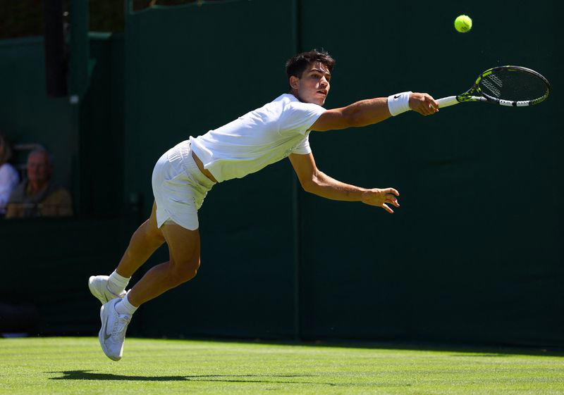 tennis-alcaraz sharpened grass game after queen's defeat