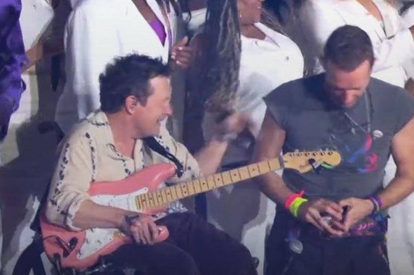 glastonbury 2024: coldplay make history with michael j. fox on stage as tom cruise watches on