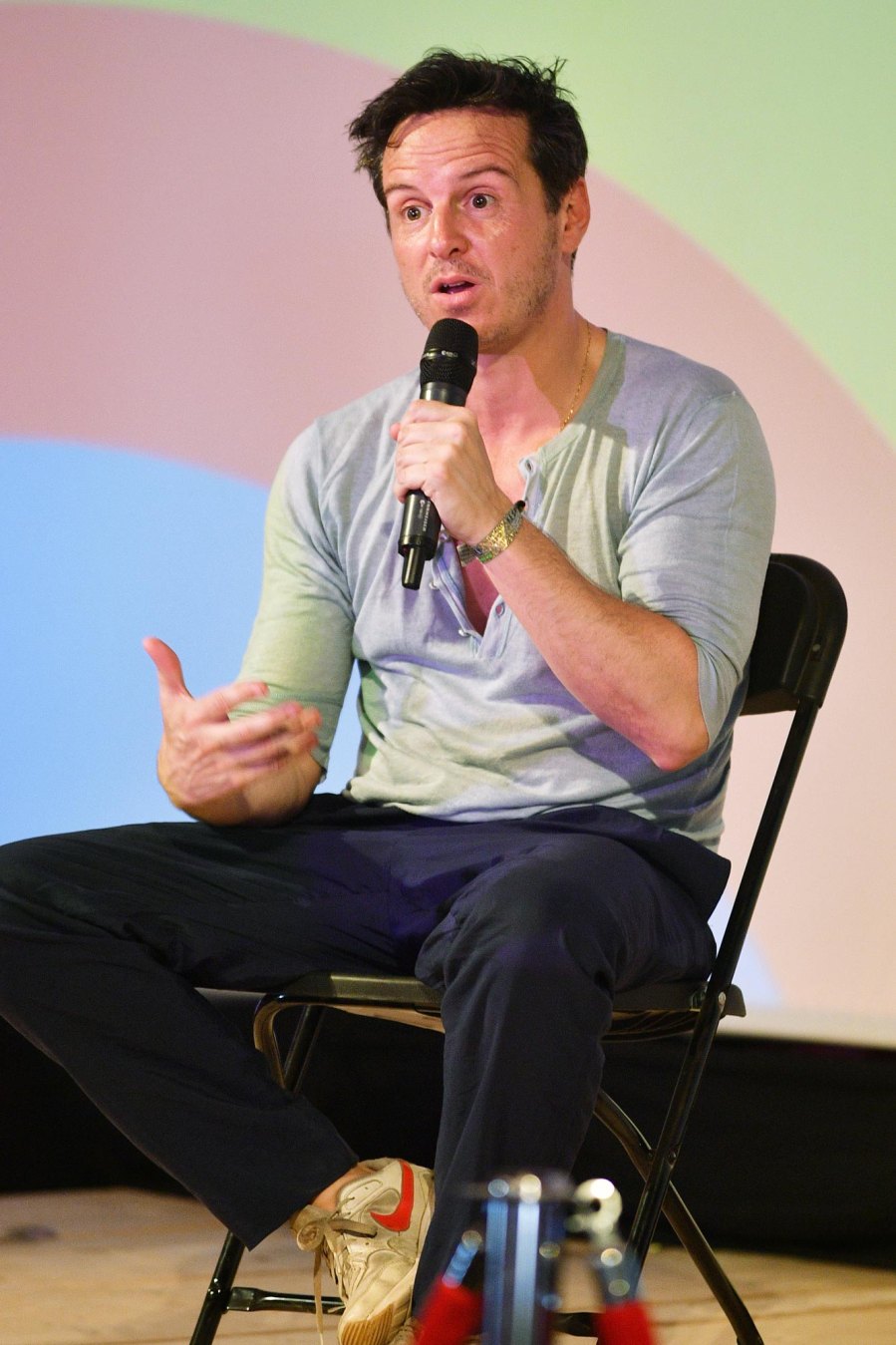 <p>Scott kept it simple with a blue henley, dark pants and white Nikes with an orange swoosh.</p>