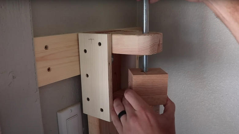 diy a swing-out garage tool storage solution if you're running low on space