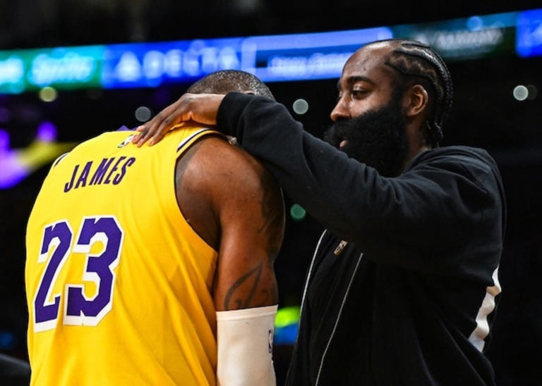 Nov 1, 2023; Los Angeles, California, USA; LA Clippers guard James Harden (1) greets Los Angeles Lakers forward LeBron James (23) on the sidelines during the fourth quarter at Crypto.com Arena. Mandatory Credit: Jonathan Hui-USA TODAY Sports