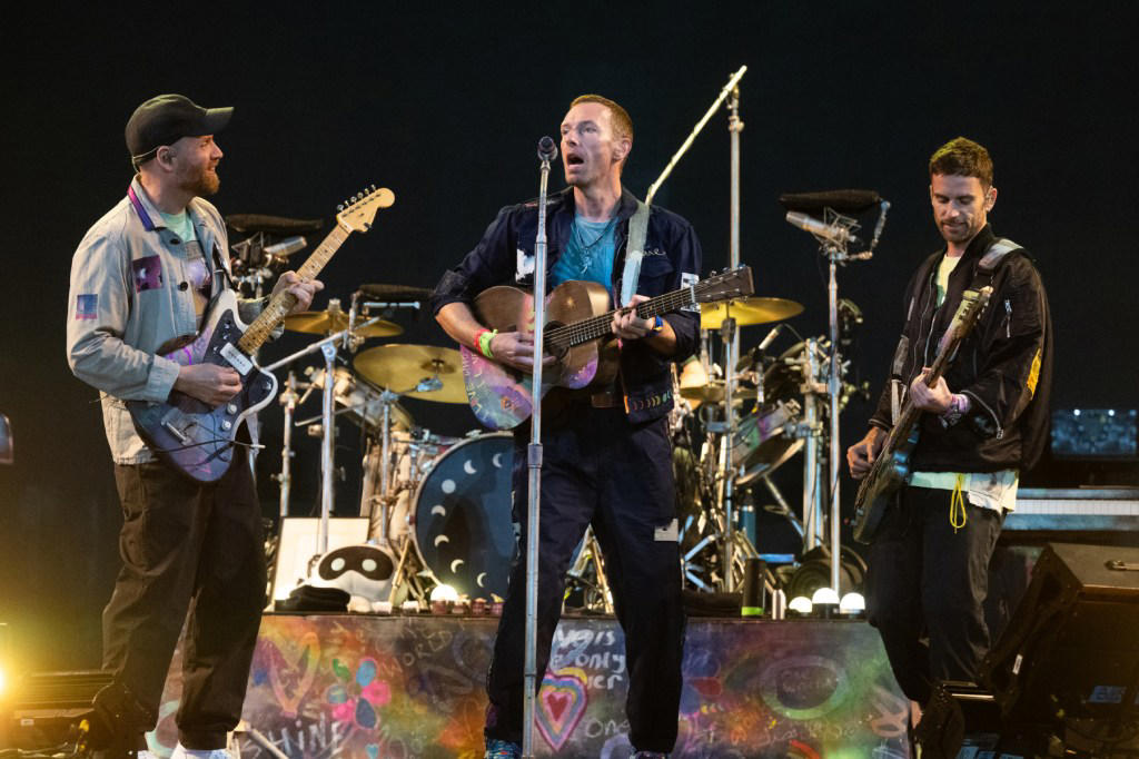 watch michael j. fox join coldplay on guitar at glastonbury