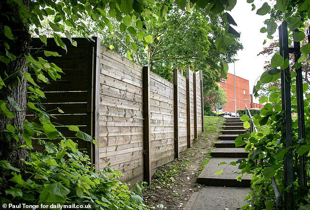 man told to tear down 8ft fence by 'ridiculous' council 'buffoons'