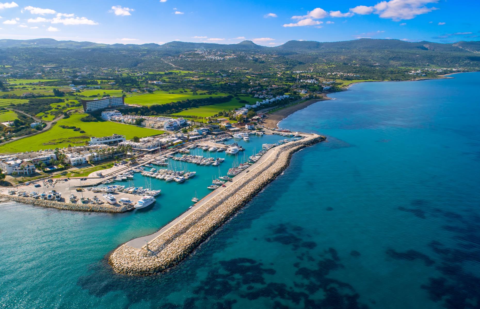 <p>Latchi, located on the Akamas Peninsula in northwestern Cyprus, is a pretty fishing region home to fish markets, cafés, bars and restaurants serving the catch of the day. Seen from above, the idyllic boating harbor is a stunning sight against the lush green Akamas National Park.</p>