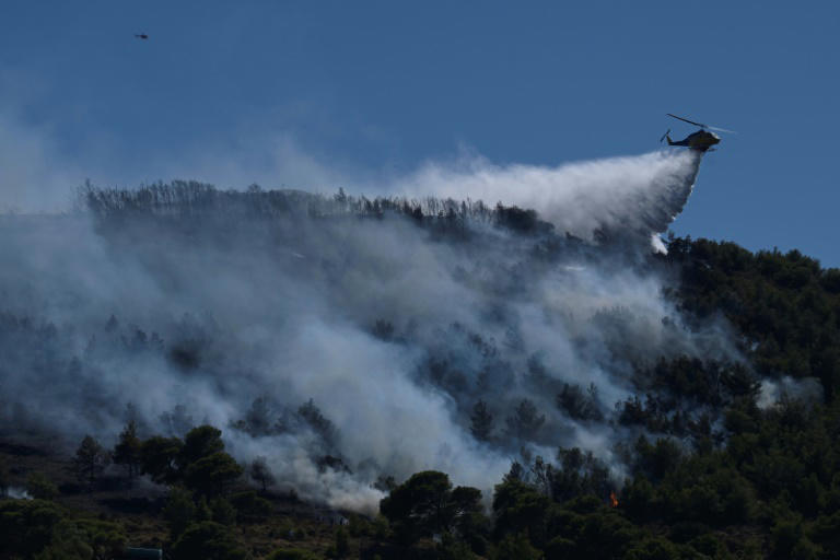 greece fights dozens of wildfires in 'most difficult day of year'