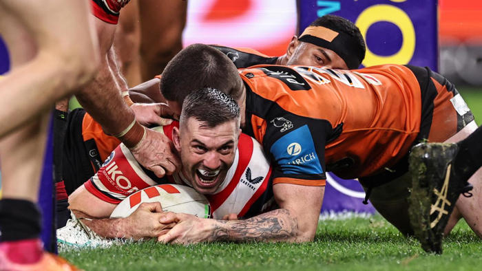 manu injured as hot roosters tame last-placed tigers