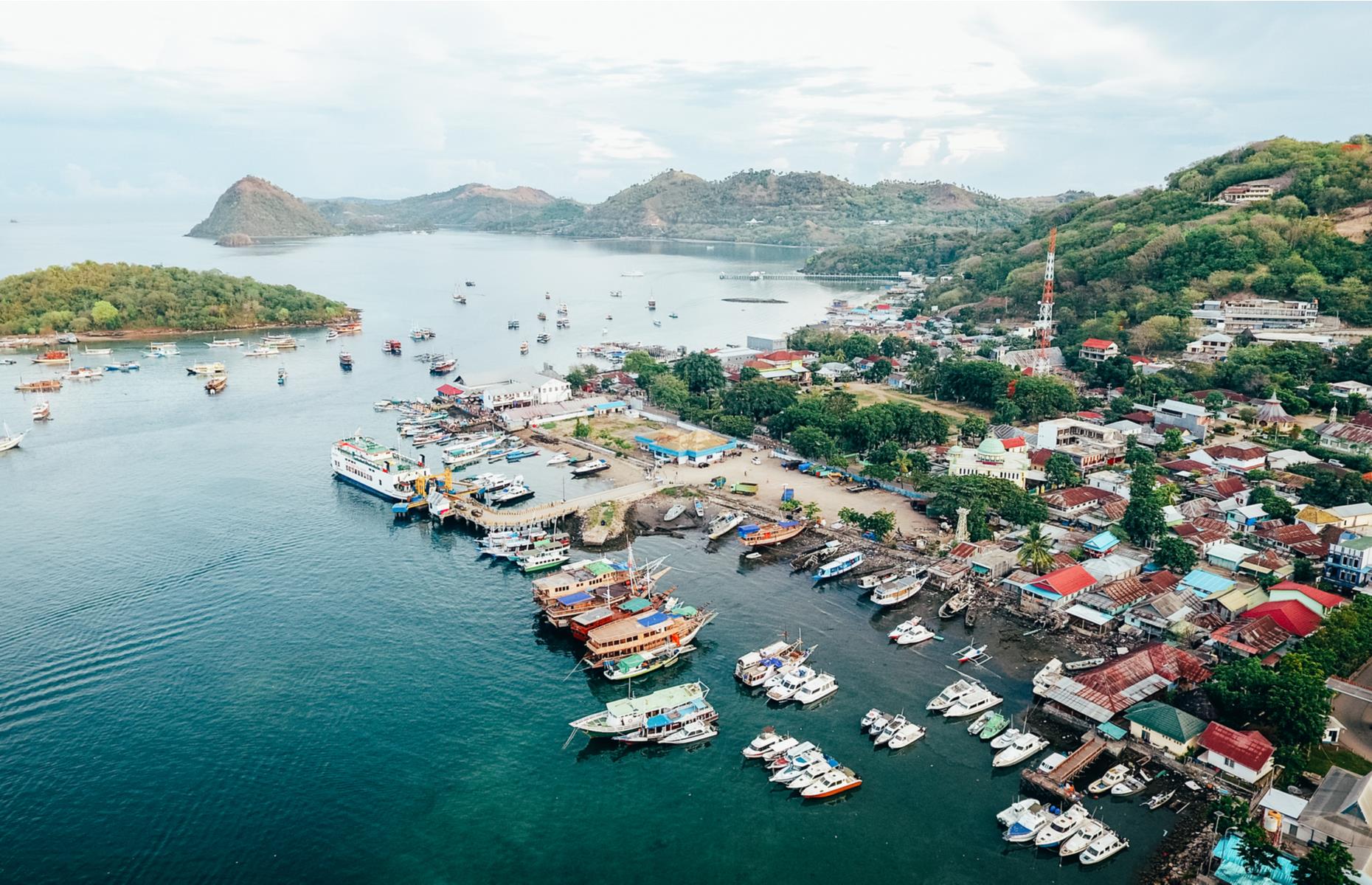 Spotted with colorful fishing boats and surrounded by verdant green hills, Labuan Bajo, a small fishing village turned bustling town, still retains plenty of its historic charm. Located on the westernmost region of Flores in Indonesia, it’s usually a popular spot with visitors, many of whom choose to take trips across to the nearby Komodo Island and Rinca Island.