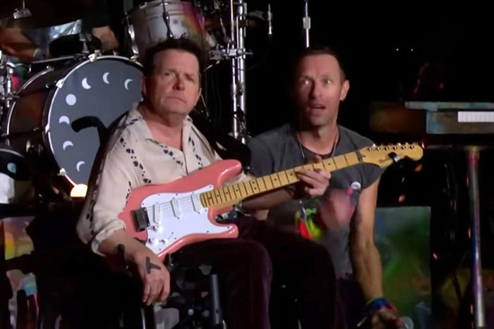 how to, michael j. fox joins coldplay to play guitar during 'fix you' at the band's glastonbury set: watch