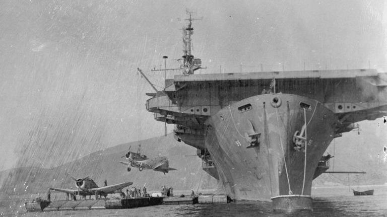USS Bismarck Sea loading planes
