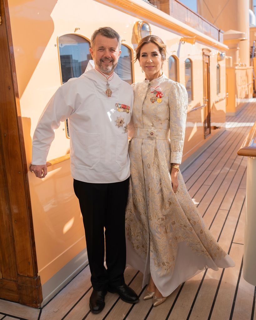 <p>The couple pictured before they attended an official dinner at Kulturhuset Katuaq in Nuuk. Mary <a href="https://www.hellomagazine.com/fashion/royal-style/704505/queen-mary-denmark-regal-beauty-cinched-gown-gilded-gold/">looked beautiful in a white and gold brocade gown</a> while Frederik donned a traditional nation outfit. </p>