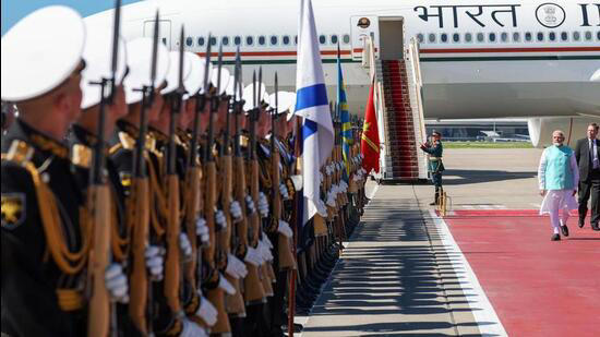 Prime Minister Narendra Modi receives a guard of honour upon his arrival at the airport in Moscow on July 8.