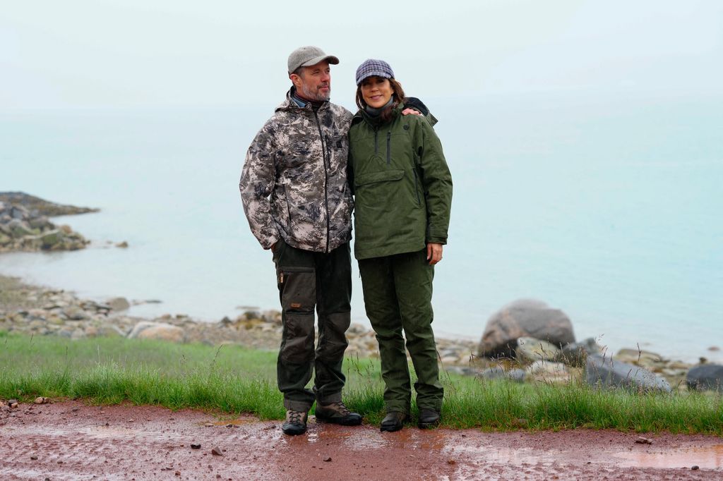 <p>And during a picturesque hike along Qassiarsuk's scenic coastline, Frederik wrapped his arms around his wife as they happily posed for a photograph. </p>