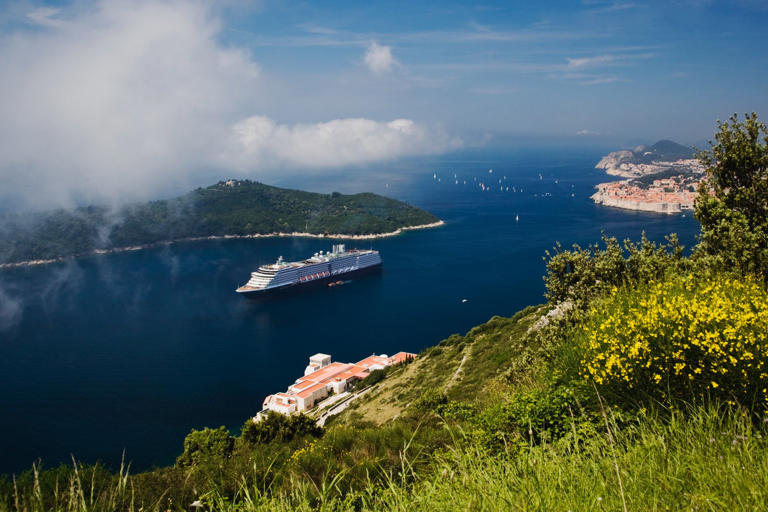 Cruise ship in Adriatic Sea with Dubrovnik in background
