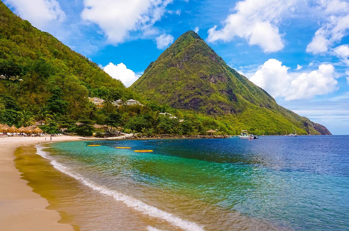 <p>St. Lucia, a gem in the Caribbean, is renowned for its natural beauty, from the iconic Pitons rising majestically above the turquoise sea to lush rainforests and golden beaches. This island paradise is not just a haven for couples and <a href="https://honeymoons.com/st-lucia-sandals-resorts/">honeymooners</a>, but also a fantastic destination for families seeking a blend of relaxation and adventure.</p>  <p>Here's a curated list of family-friendly resorts in St. Lucia that cater to the needs of all ages, ensuring an unforgettable vacation experience for everyone. From luxurious amenities and kids' clubs to thrilling watersports and peaceful spa treatments, these resorts offer a wide range of activities and services to make your family holiday both exciting and rejuvenating.</p>  <p><a href="https://cbayresort.com/"><strong>Coconut Bay Resort & Spa</strong></a></p>  <p>This resort has distinct areas for families (Splash) and <a href="https://honeymoons.com/saint-lucia-adult-only-all-inclusive/">adults</a> (Harmony), featuring a lazy river, private beach access, and special programs for children over the age of 2, making it an exciting option for a family holiday.</p>  <p><a href="https://www.starfishresorts.com/resort/starfish-st-lucia"><strong>Starfish St. Lucia</strong></a></p>  <p>As a budget-friendly option, Starfish St. Lucia offers various family-oriented activities and entertainment, including water sports, games, and nightly shows. The resort also features a children's club suitable for kids aged 4-12 years.</p>  <p><a href="https://www.ansechastanet.com/"><strong>Anse Chastanet</strong></a></p>  <p>This luxury resort is suitable for families with children aged 10 and above (or 6 and above from July to September). It offers an all-inclusive meal plan, beach access, and various non-motorized water sports, providing a serene experience for families with older kids.</p>  <p><a href="https://www.baygardensresorts.com/beach-resort"><strong>Bay Gardens Beach Resort & Spa</strong></a></p>  <p>Located on Reduit Beach, this resort offers all-inclusive plans including free non-motorized sports and access to the Splash Island Water Park. It's a family-friendly resort with amenities like spa treatment and activities for children.</p>  <p><a href="https://www.viceroyhotelsandresorts.com/sugar-beach"><strong>Sugar Beach, A Viceroy Resort</strong></a></p>  <p>Sugar Beach is a luxurious resort beside the Pitons, featuring rooms with private plunge pools, poolside cabanas, a kids' club, and separate activities for teens and tweens. It offers indulgent experiences at The Rainforest Spa and various dining options.</p>  <p><a href="https://stjamessclubmorganbayresort.com-hotel.com/en/"><strong>St. James's Club Morgan Bay</strong></a></p>  <p>This all-inclusive resort boasts seven restaurants, five bars, four pools, and a range of activities including watersports and a kids' club. Located on Choc Bay, near Rodney Bay Village, it offers a variety of entertainment and dining options for families.</p>  <p><a href="https://www.royaltonresorts.com/royalton-saint-lucia"><strong>Royalton Saint Lucia</strong></a></p>  <p>Near Rodney Bay, Royalton Saint Lucia offers a range of amenities including a spa, kids' and teens' clubs, and a Seaside Summer Camp. The resort features watersports, fitness classes, and a water slides park, making it ideal for families.</p>  <p><a href="https://www.windjammer-landing.com/"><strong>Windjammer Landing</strong></a></p>  <p>This family-friendly resort offers a kids' club, teen center, and babysitting services. It features amenities such as tennis courts, fitness centers, wellness packages, and sea or land excursions for family outings.</p>  <p>   <em><p><a href="https://honeymoons.com/familymoon/"><em>This story</em></a><em> was produced by </em><a href="https://honeymoons.com"><em>Honeymoons.com</em></a><em> and reviewed and distributed by Stacker Media.</em></p></em>  </p>