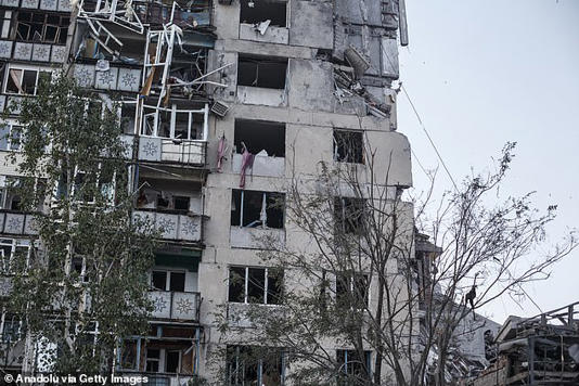 A view of a collapsed building at the town of New York (Niu-York) as Torecki has so far been one of the quietest sections of the front line as the Russians started shelling the area