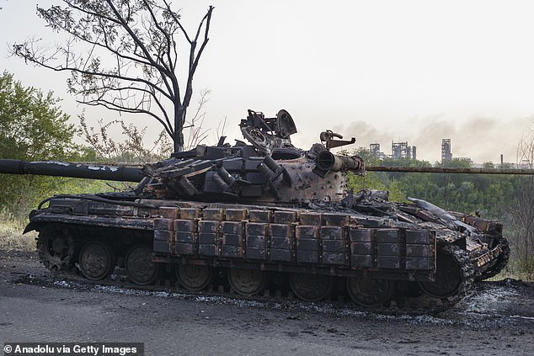 A view of a destroyed tank at the town of New York (Niu-York) as Torecki has so far been one of the quietest sections of the front line