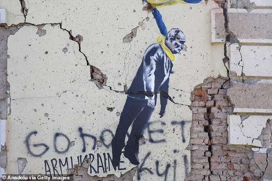 A view of a wall mural depicting Russian President Vladimir Putin in Kostiantynivka, Ukraine on June 30, 2024