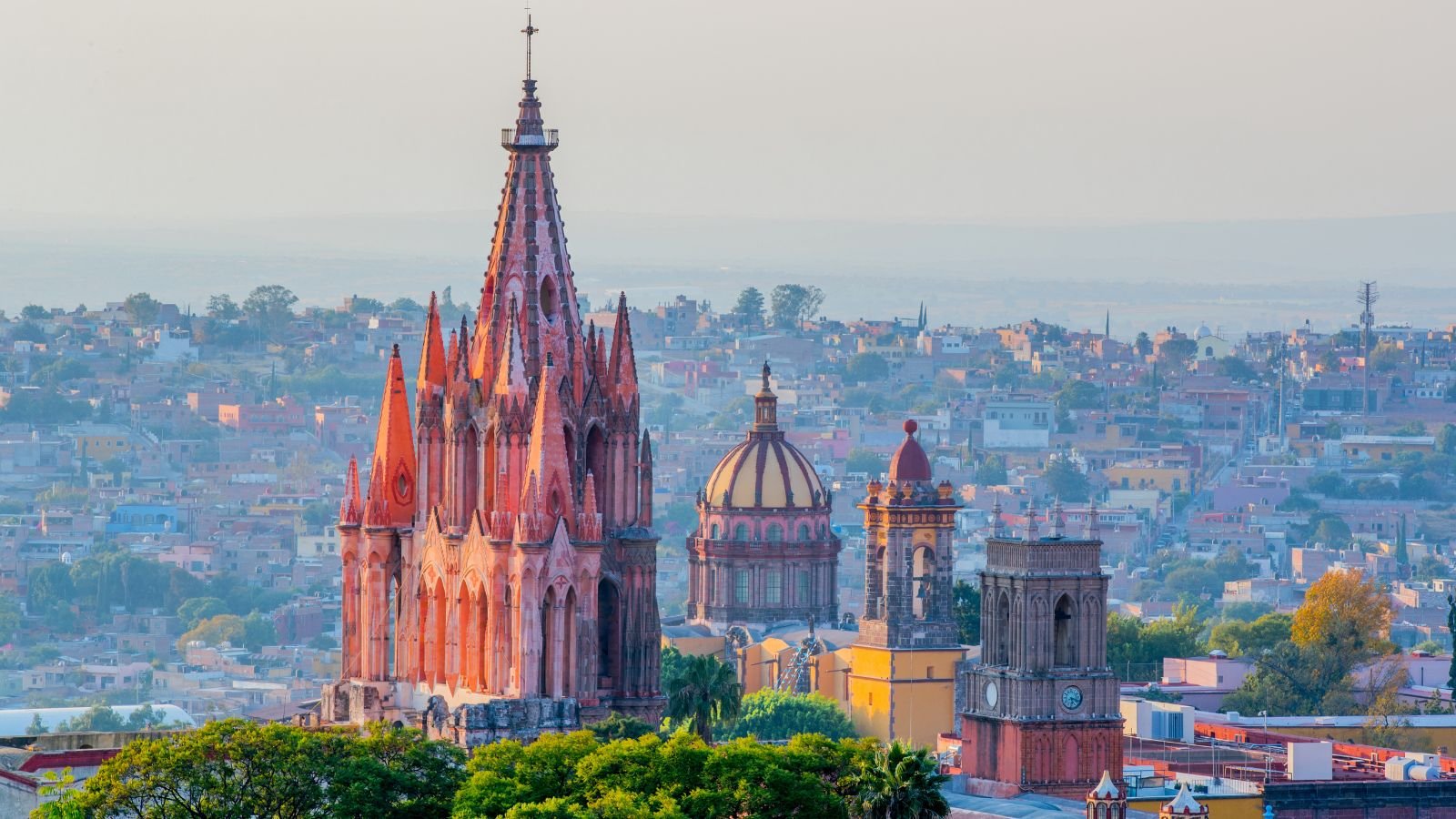 <p>San Miguel de Allende is a picturesque colonial town with a cost of living of <a href="https://casasanjosesma.com/blog/cost-of-living-in-san-miguel-de-allende" rel="noopener">less than $1,500</a>. It is home to <a href="https://mexicorelocationguide.com/living-and-retire-in-san-miguel-guide/" rel="noopener">about 10% of expats</a> among its total population. The city is known for its vibrant art and color architecture. It is a heaven for creatives and retirees alike. The high-desert climate offers warm days and cool nights year-round. While there is no local airport, you can access it via Leon which is 2 hours away, or Queretaro which is 1 hour away. The city’s bilingual atmosphere makes it easy for English speakers to integrate.</p>