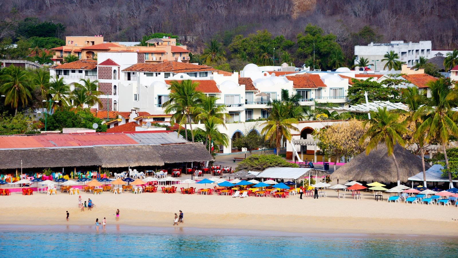 <p>Huatulco is a planned development by Fonatur and has over 55,000 residents including <a href="https://internationalliving.com/best-places-live-mexico-u-s-expat/#:~:text=Huatulco%3A%20A%20Hidden%20Gem%20in%20Southern%20Mexico,-%C2%A9iStock%2FUser10095428_393&text=There%20are%20only%20about%2056%2C000,from%20Canada%20spend%20winters%20here." rel="noopener">around 1,000 expats</a> and part-time visitors. The city is divided into three main areas- La Crucecita which is a commercial center, Santa Cruz which is a marina area, and Chahué which is a residential seaside. Despite its small size, Huatulco boasts an international airport with direct flights to the U.K., U.S., and Canada.</p>