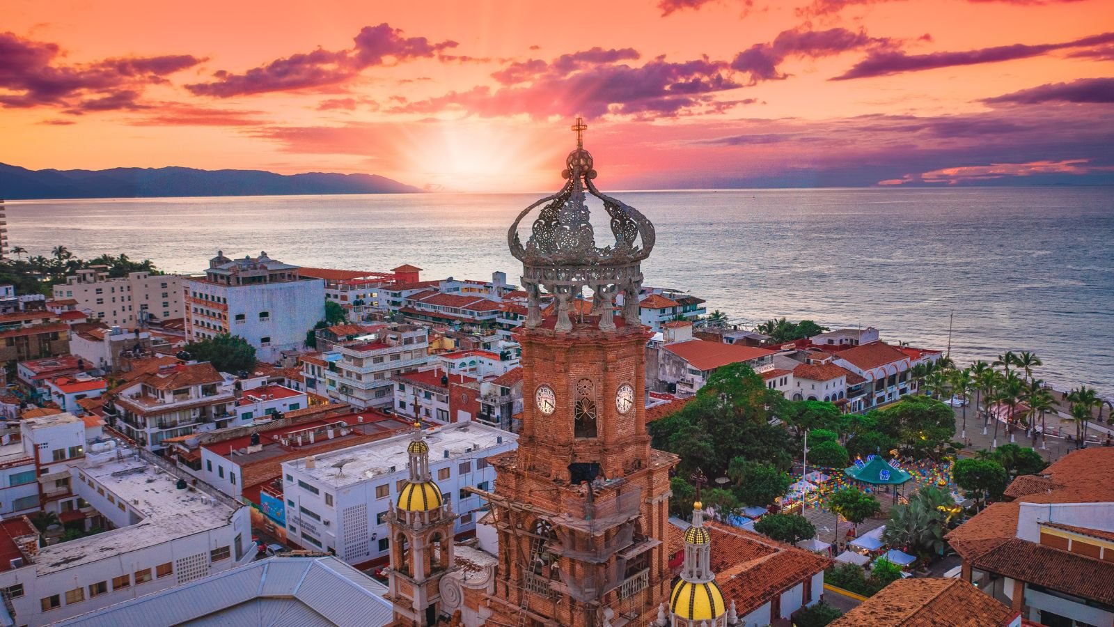<p>Puerto Vallarta, stretching 30 miles along Banderas Bay, has been an expat haven for 60 years. The vibrant coastal city offers a perfect blend of beach life and cultural experiences for <a href="https://mexicorelocationguide.com/retire-in-puerto-vallarta/#:~:text=The%20overall%20population%20in%20Puerto,in%20the%20city%20year%2Dround." rel="noopener">over 40,000 expats</a>. The Riviera Nayarit area provides endless activities, from golfing to mountain adventure. With excellent healthcare facilities and easy flights to the U.S., it is a top choice for medical tourism. Moreover, the cost of living is within $2000 per month, making this city an affordable choice.</p>