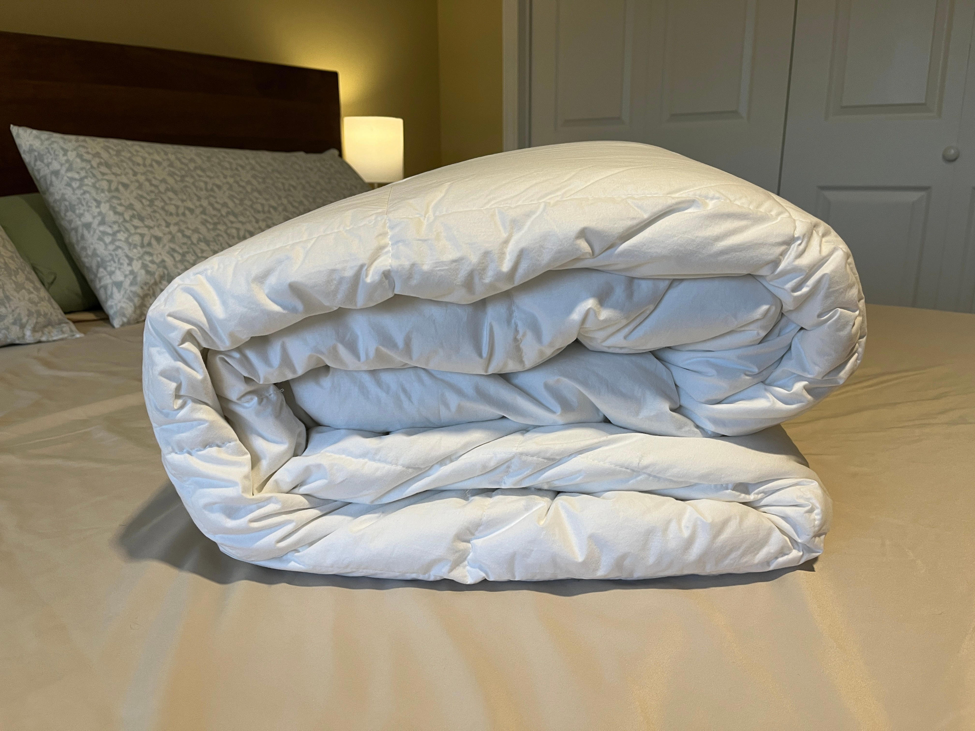 silk & snow duvet folded on a bed