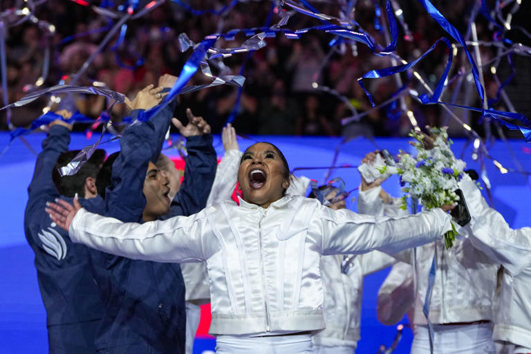 Jordan Chiles celebrates after she was named to the 2024 Olympic team at the United States Gymnastics Olympic Trials on Sunday, June 30, 2024, in Minneapolis. (AP Photo/Charlie Riedel)