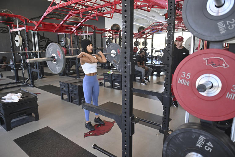 FILE - Olympic long jumper Tara Davis-Woodhall, works out at the Frank O'Mara Track and Field High Performance Center, Thursday Jan. 18, 2024, in Fayetteville, Ark. (AP Photo/Michael Woods, File)