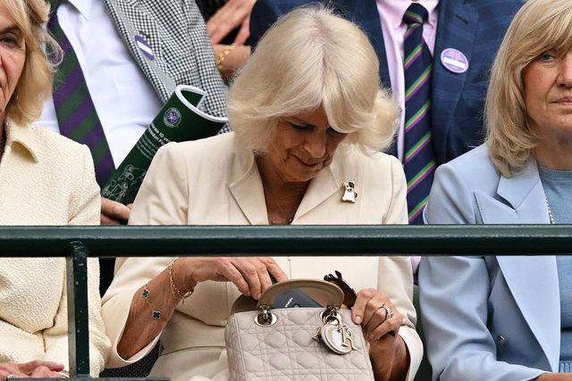 ANDREJ ISAKOVIC/AFP via Getty Queen Camilla at Wimbledon on July 10, 2024.