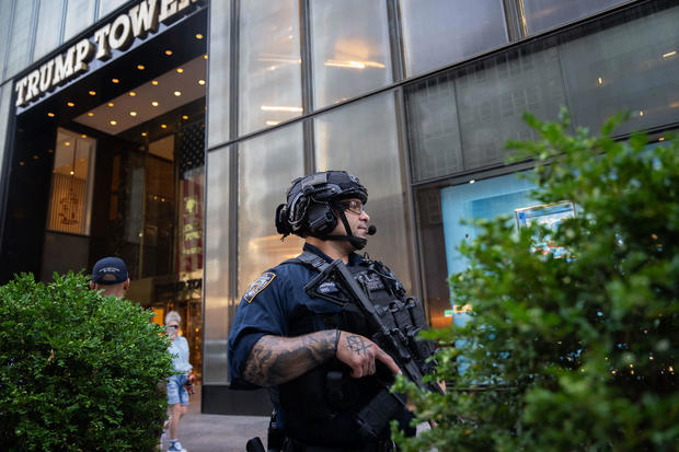 Law enforcement stand guard outside of Trump Tower in New York City, after Former President Donald Trump was injured when shots were fired at a rally in Pennsylvania on July 13, 2024. ADAM GRAY/AFP via Getty Images