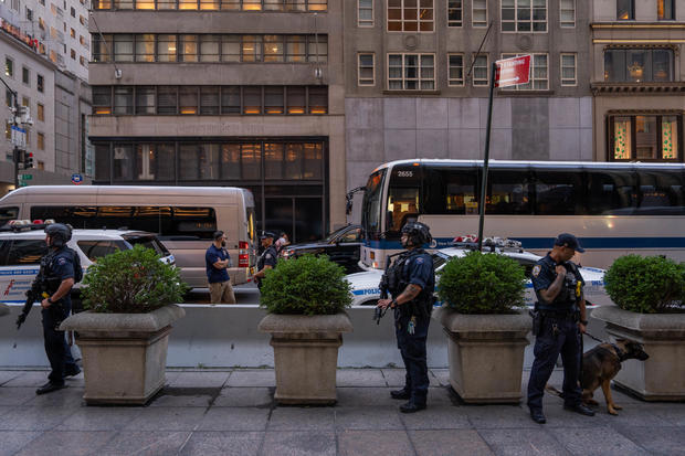 Law enforcement stand guard outside of Trump Tower in New York City, after Former President Donald Trump was injured when shots were fired at a rally in Pennsylvania on July 13, 2024. ADAM GRAY/AFP via Getty Images