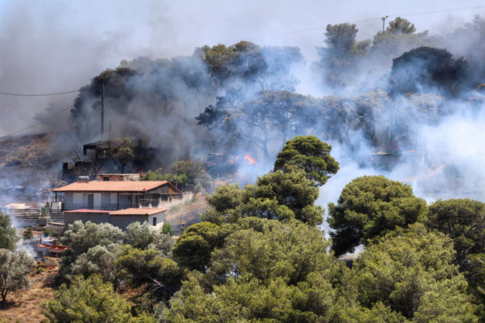 race against time to evacuate people near athens as wildfires rage