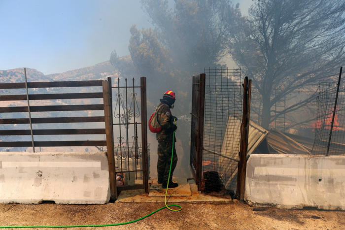 race against time to evacuate people near athens as wildfires rage