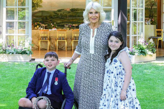 queen camilla hosts special afternoon tea for boy who missed palace garden party due to traffic