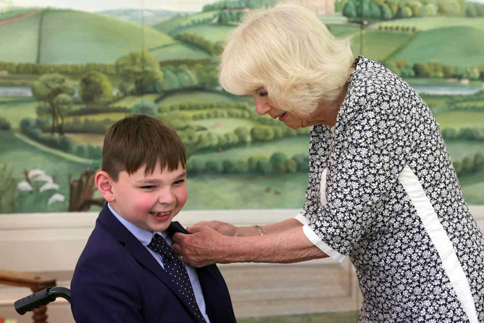 queen camilla hosts special afternoon tea for boy who missed palace garden party due to traffic