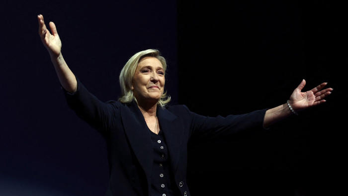 marine le pen's far-right party leads in first round of snap french election